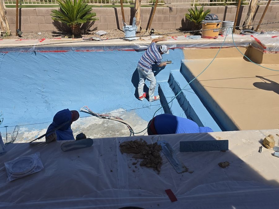 Fresh & Clear crew resurfacing a residential pool