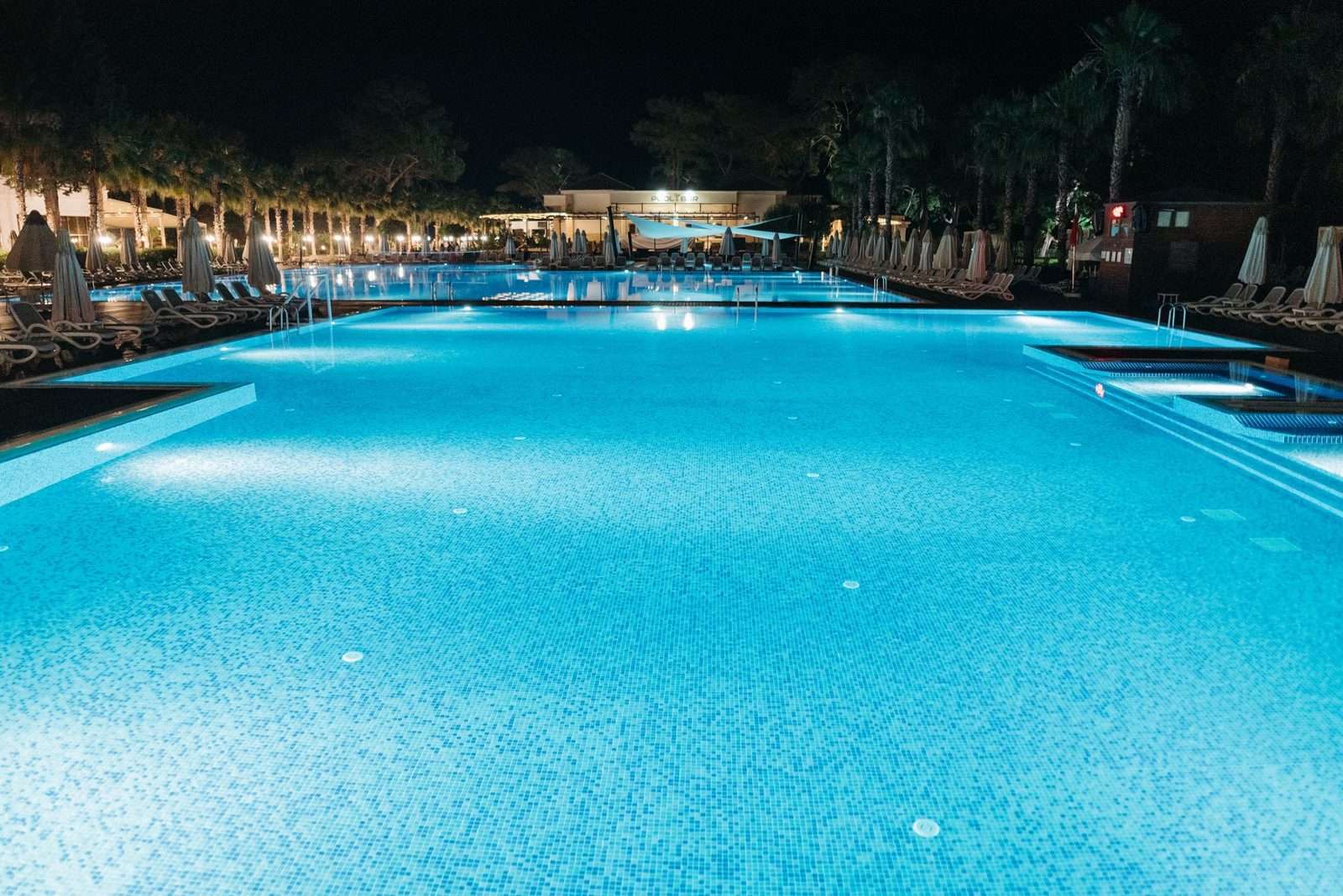 Swimming pool illuminated at night