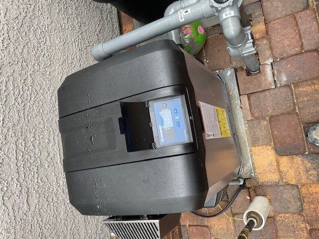 Gas pool heater installed on a residential pad