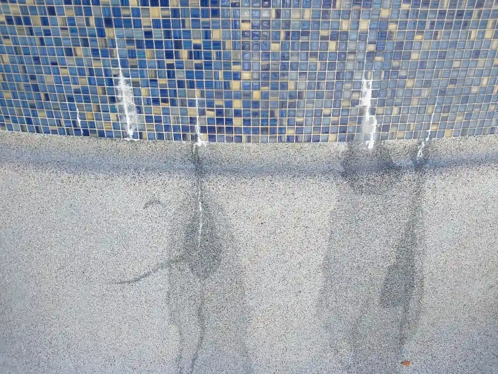 Pool or spa tile and waterline condition before tile bead blast.