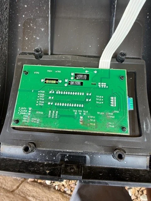 Pool heater control circuit board and attached wiring.