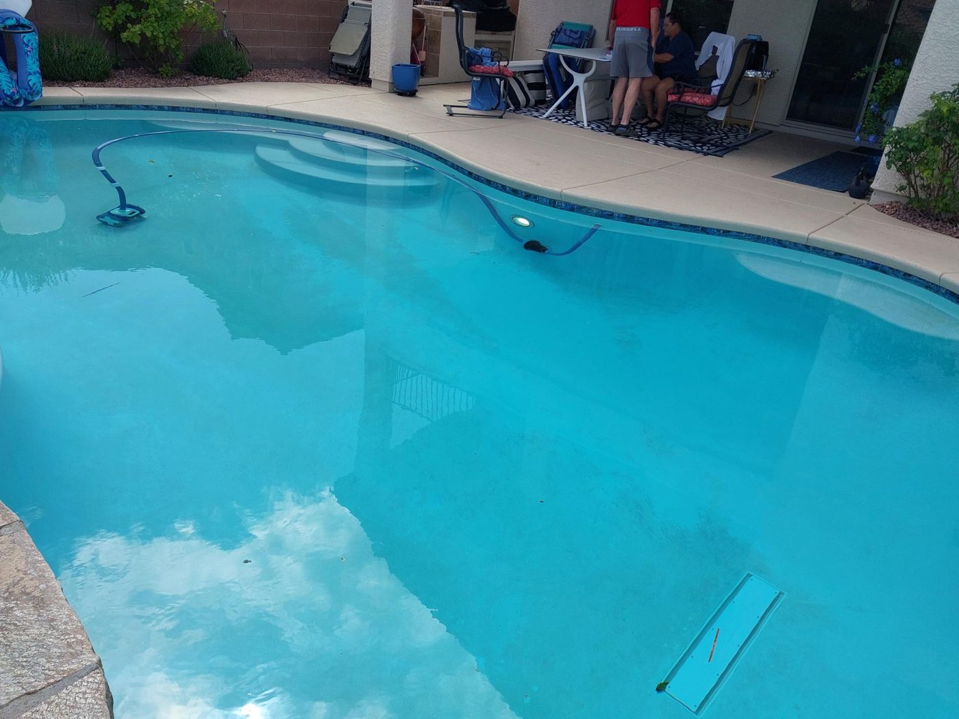 Sparkling residential pool with clear blue water