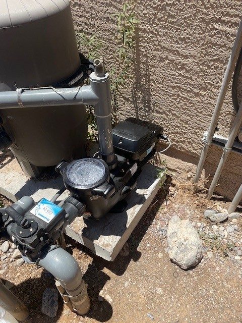 New pool pump and plumbing on an equipment pad