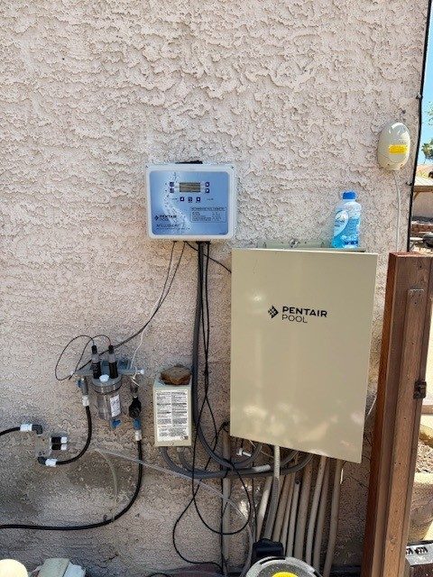 Automation panel and salt system on an equipment wall
