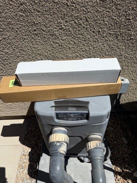 UV system under repair on a residential pad