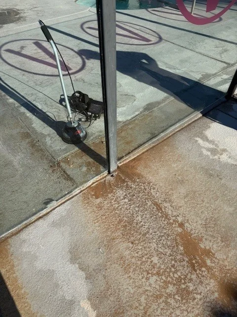 Poolside leak investigation equipment or exposed plumbing during repair.