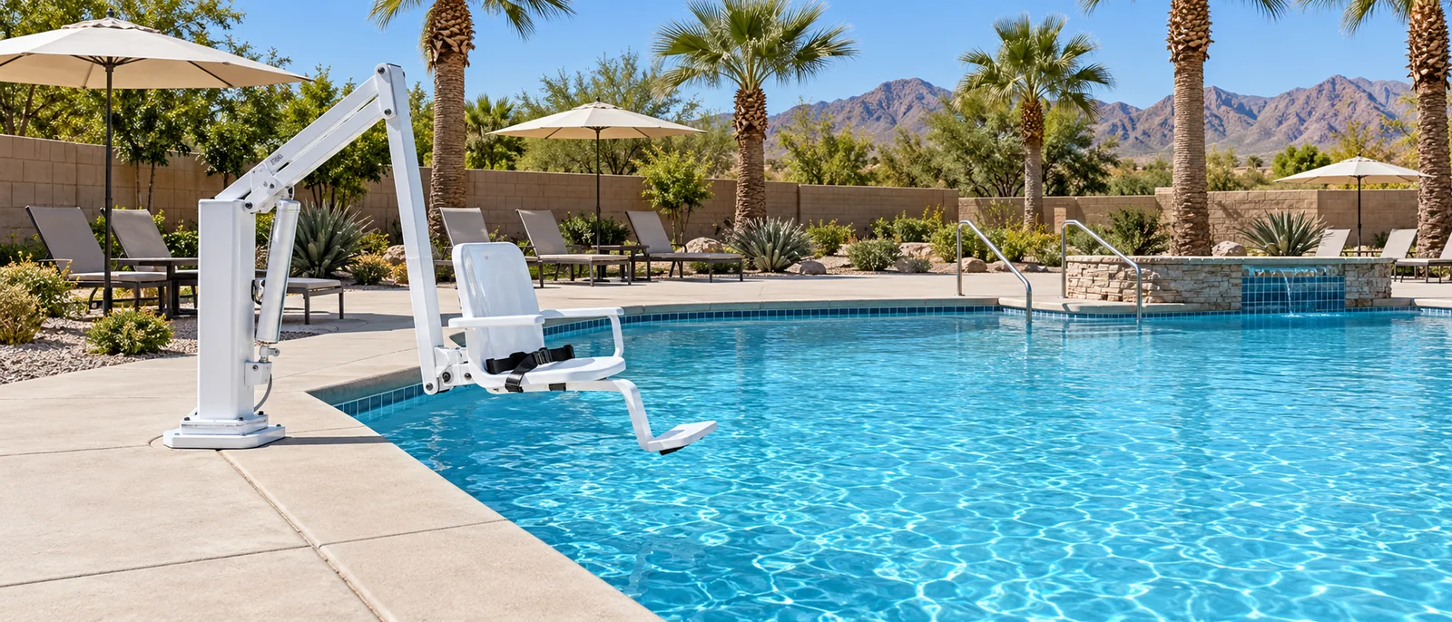 Accessible pool lift and seat beside a clean swimming pool.
