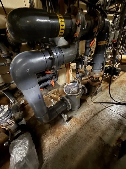 Commercial pool pump plumbing and valves.
