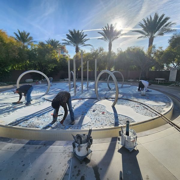 Applying new plaster, commercial pool by Fresh & Clear Pool Service
