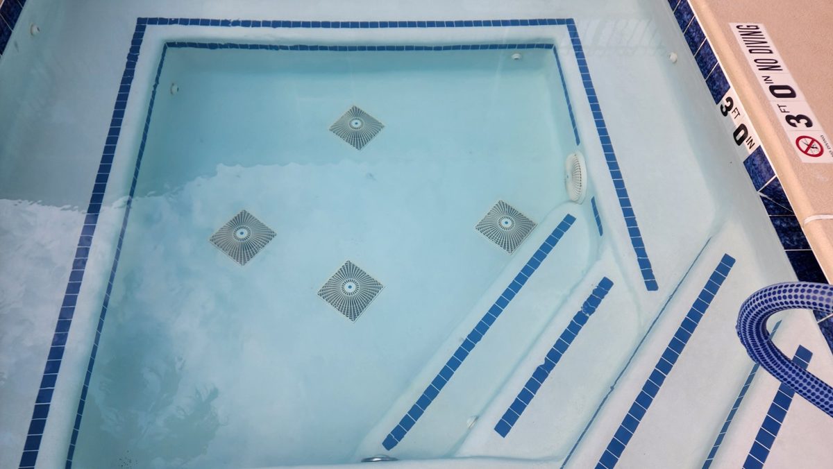 Finished commercial spa with new plaster and blue tile, by Fresh & Clear
